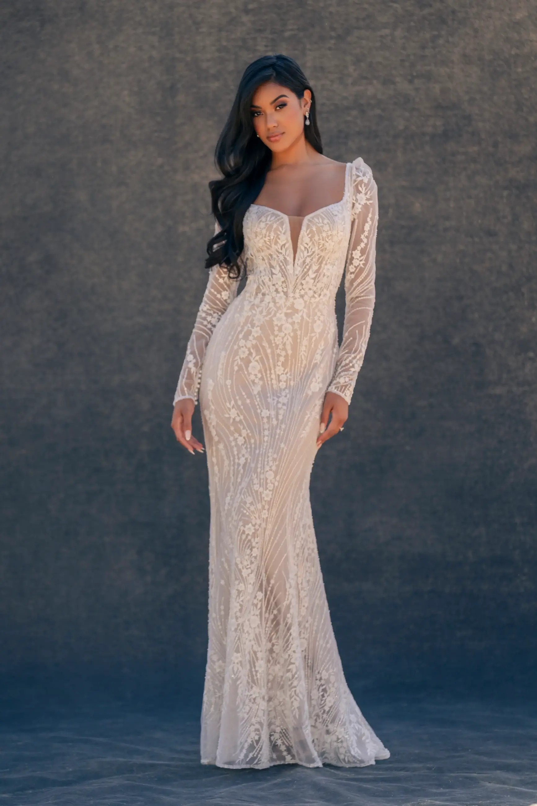 Lace, Satin, and More: Exploring the Best Fabrics for Long Sleeve Wedding Gowns Image