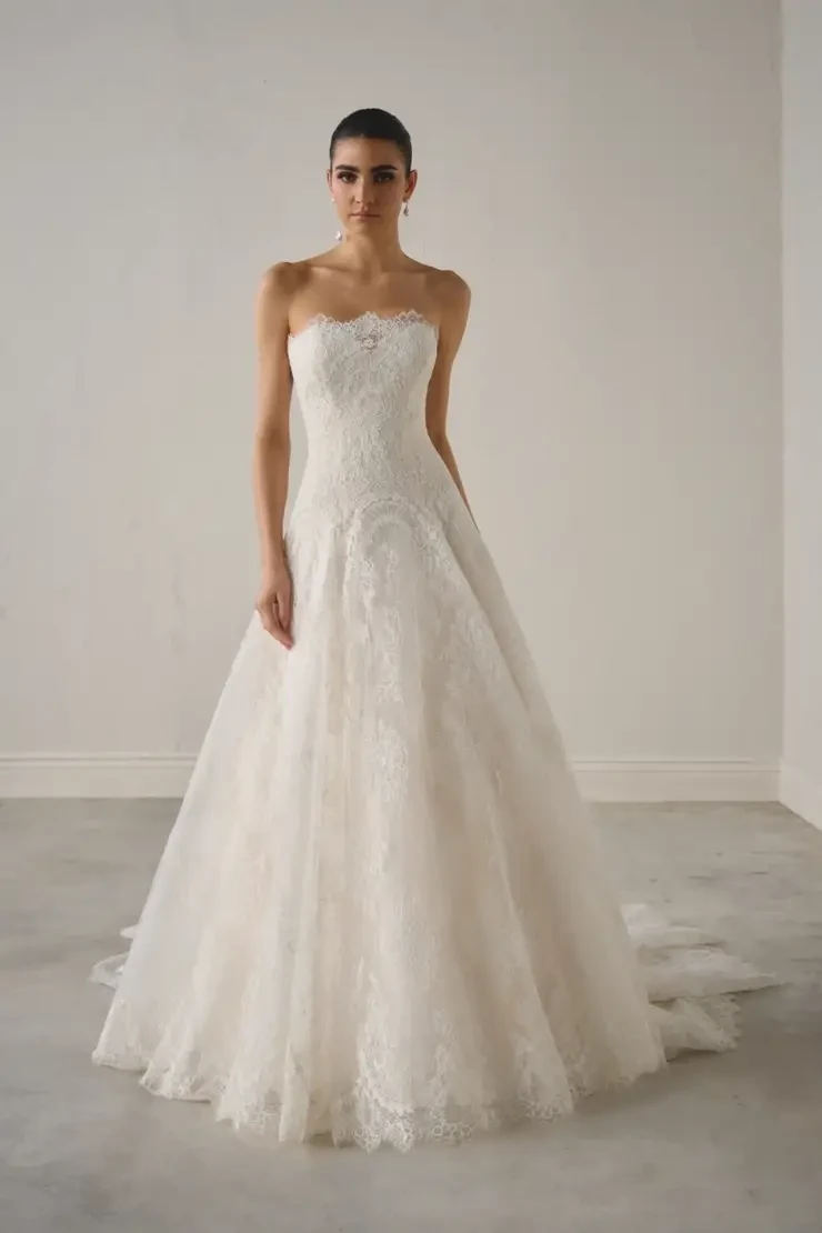 model is wearing a strapless bridal gown