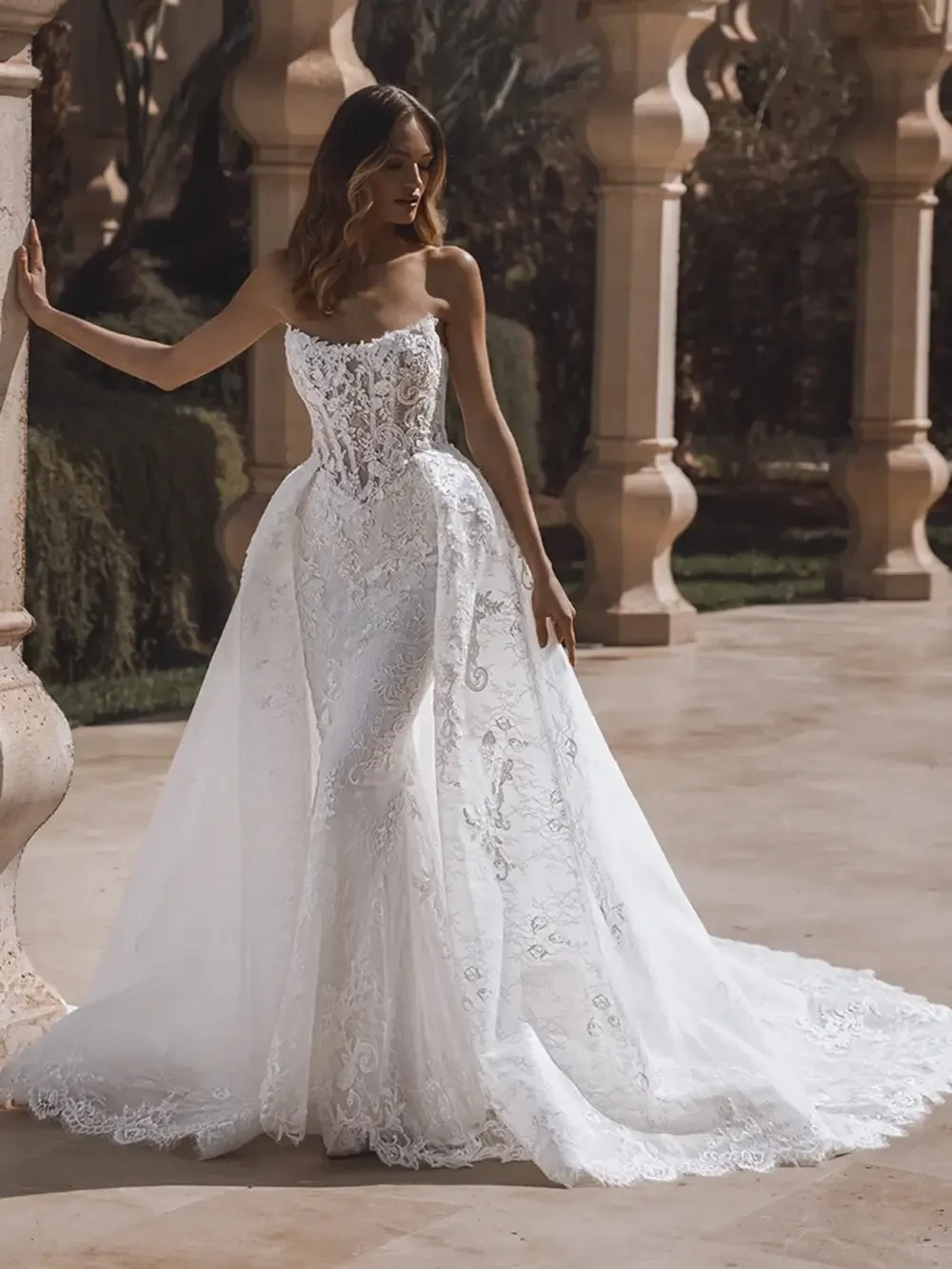 model is wearing a strapless bridal gown